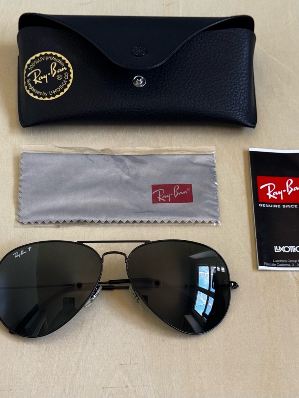 Ray-Ban Sunglasses with Black Frame and Dark Lenses